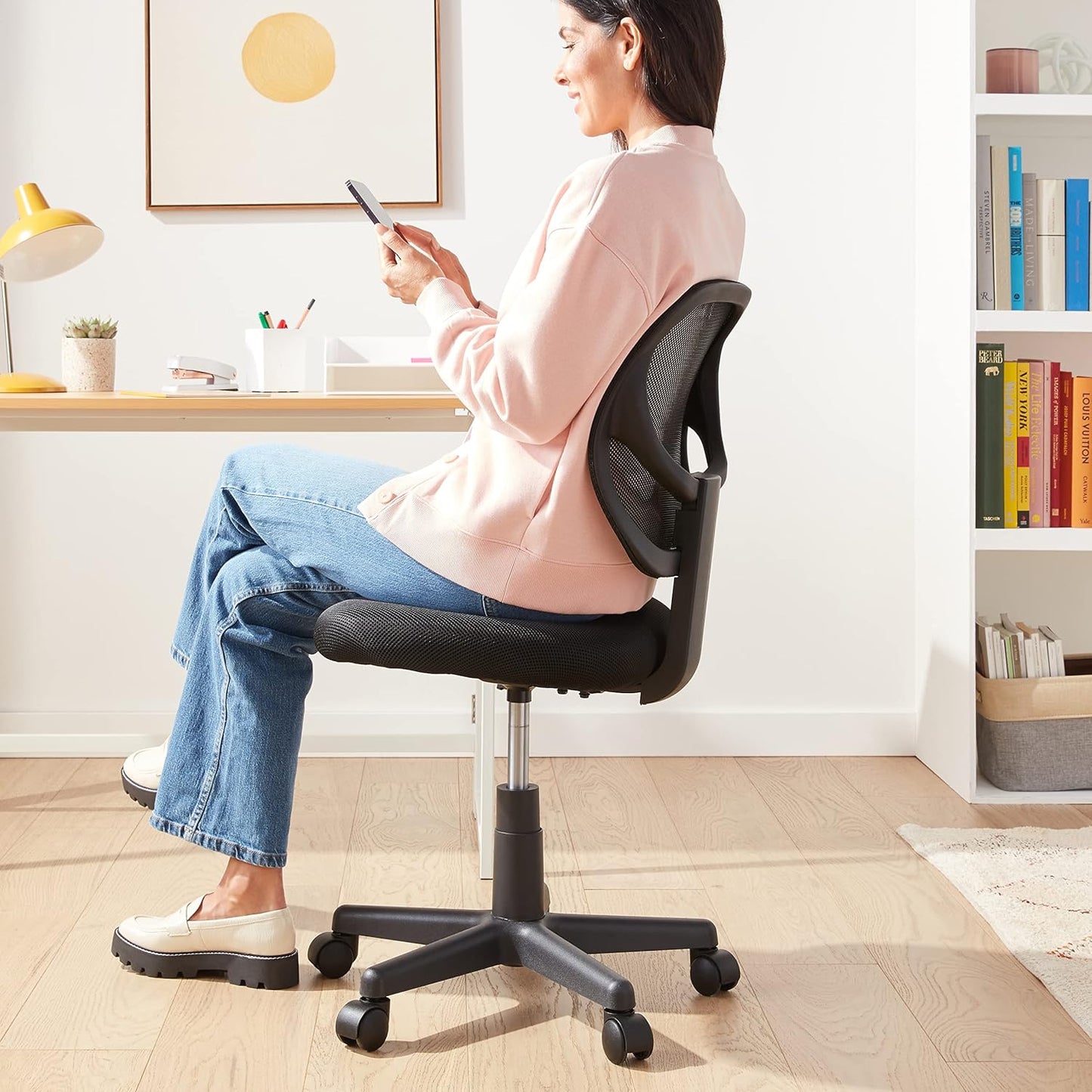 Amazon Basics Rolling Desk Chair, Adjustable, Low Back, Padded Seat, Breathable Mesh, Swivel, Black, 21.25" D x 22.5" W x 38" H